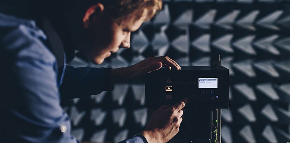 A man checking a Charger from Micropower