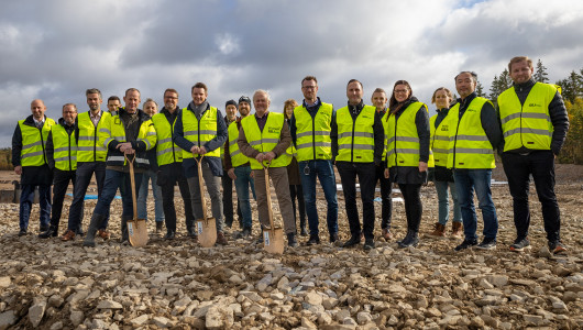 Group of people in yellow vests